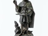 statue of a man with a dog on a white background