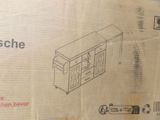 a cardboard box with a drawing of a kitchen in it