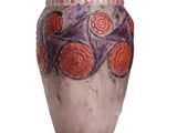 a vase that is sitting on a white surface