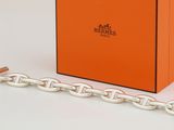 a close up of a box with a chain on it