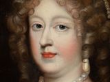 portrait of a lady with a pearl necklace and pearl earrings