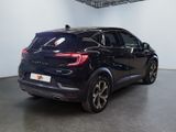 an image of a black car in a showroom