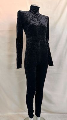 the mannequin is made of velvet and has a high neck and long sleeves