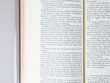 an open book that is sitting on a table