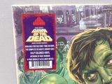 an image of a picture of a comic book with a zombie face on it