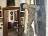an image of a living room with a statue in the center