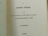 un livre sur lequel figure la photo d'un homme portant un chapeau