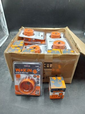 many boxes of orange and white items on a table