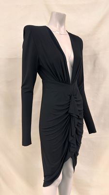 the dress is black and has long sleeves and a v - neck