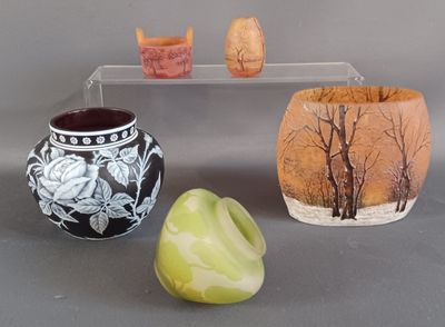 three vases sitting next to each other on a table
