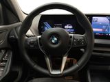 the interior of a car with a steering wheel and dashboard