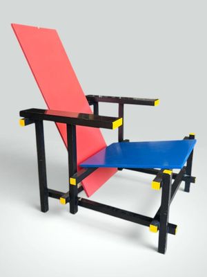 an image of a blue and red chair on a grey background
