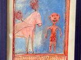 painting of a man standing next to a horse in a blue frame