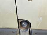 a close up of a door handle on a vehicle