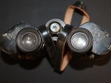 a pair of binoculars sitting on top of a table