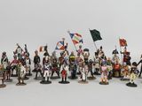 a lot of figurines of different sizes and colors