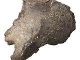 an image of a stone head of a woman