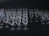 a lot of empty wine glasses on the table