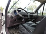 a view of the inside of a vehicle from the driver ' s seat