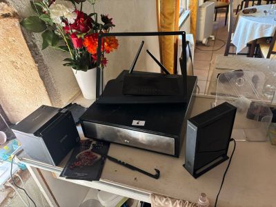 a table with a bunch of electronics on top of it