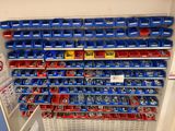many bins of assorted tools on the shelves