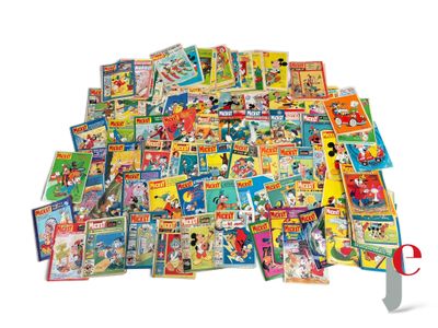 a pile of children ' s books and a pair of scissors