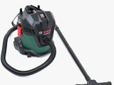 un aspirateur vert et noir sur fond blanc