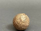 a small ball that is sitting on a table