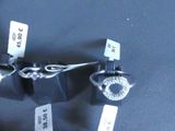 a close up of a pair of scissors with tags attached to them