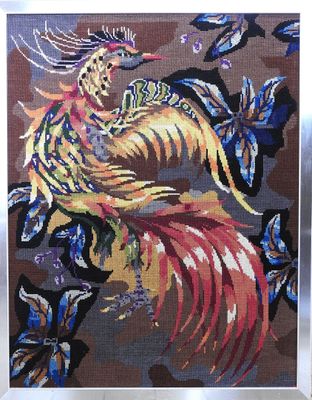 cross stitch pattern of a colorful bird surrounded by butterflies