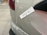 a sticker on the back of a car that says pluto