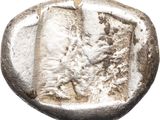 a close up of a silver coin with a lion on it