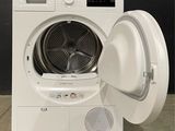 an image of a washing machine with its door open