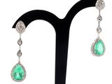 an image of a pair of emerald and diamond earrings