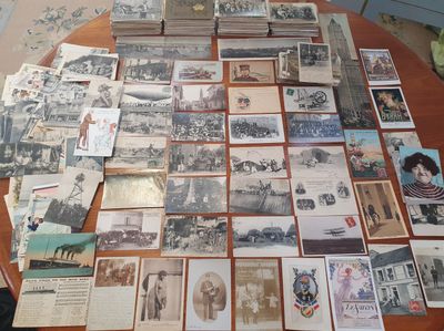 a table with a lot of old photos on it