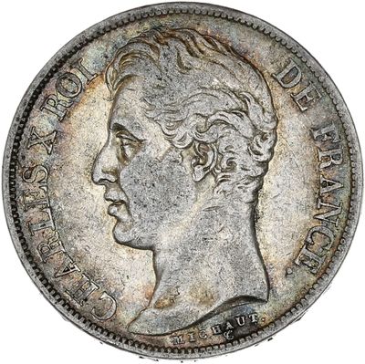 une pièce d'argent représentant la tête d'un homme de profil