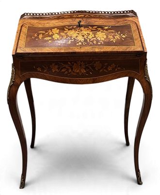 an image of a small wooden table with a floral design on it