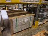 a lot of boxes and pallets in a warehouse