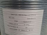 a close up of a roll of wire on a table