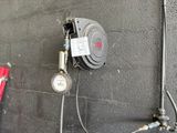 a fire hydrant that is attached to a wall
