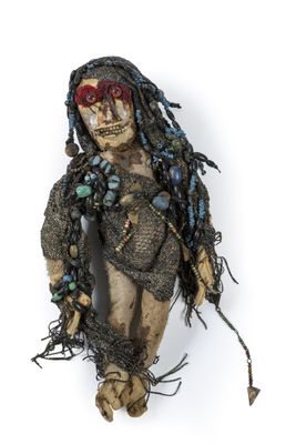 an image of a voodoo doll with dreadlocks on a white background