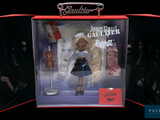a doll that is in a box on a table