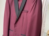 purple tuxedo with black lapel and black lapel lapel lapel