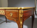 a table that has a marble top on it