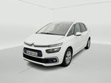 a white citrole is parked in a white room