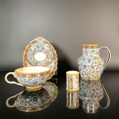 three different types of tea cups and saucers on a table