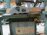 a machine that is sitting on a pallet in a warehouse