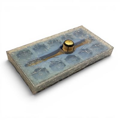 a small wooden box with a clock on it