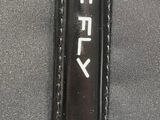 a close up of a piece of luggage with a name tag on it