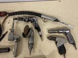 a lot of tools that are laying on the floor